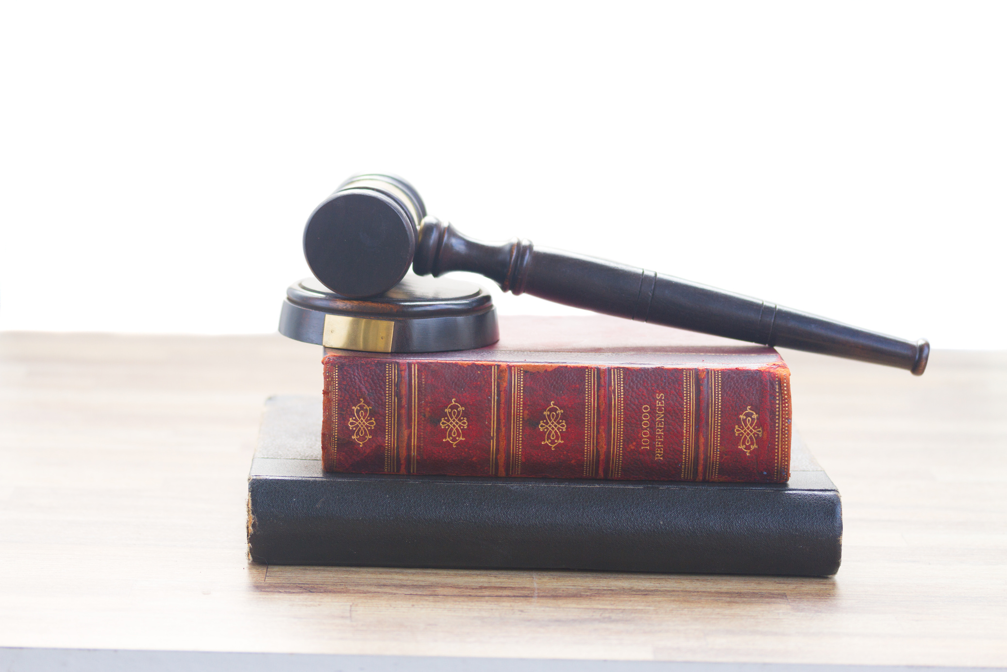 Wooden Gavel on Books